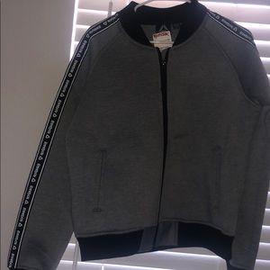 gray Reebok sports jacket